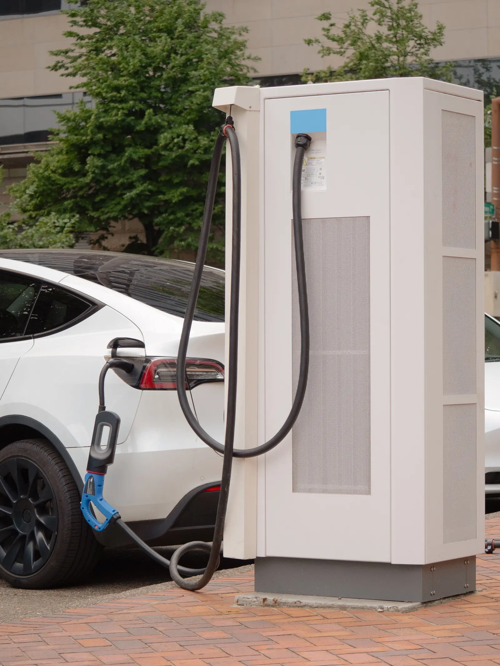 Electric vehicle connected to a charging station